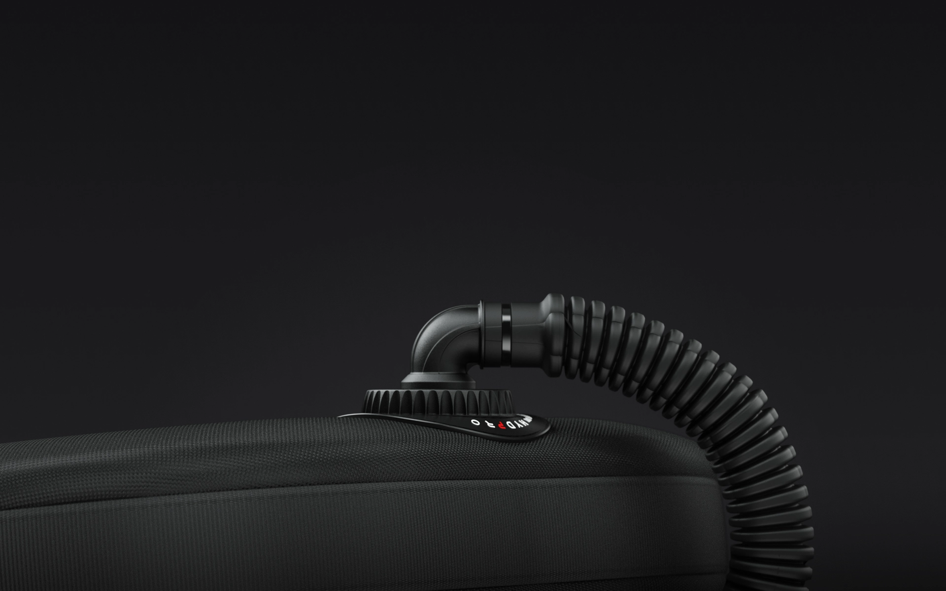 HYDPRO Pipe P01 Classic connector mounted on a black BCD bladder with corrugated hose, dark studio shot