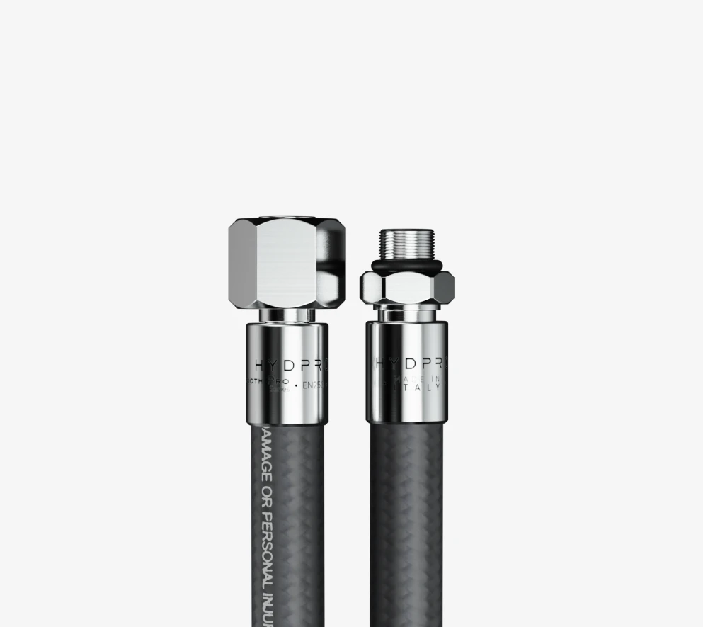 Two HYDPRO hose end fittings side by side, chrome female and male UNF connectors on braided hose
